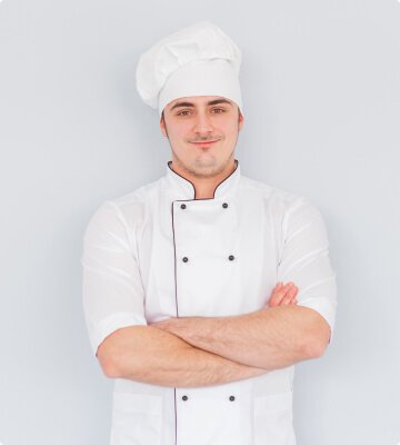 Junior chef in white uniform